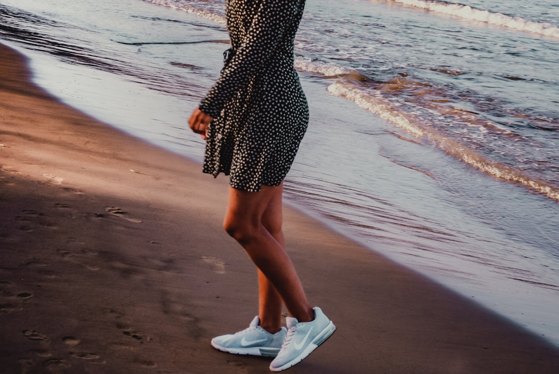 woman standing on shore