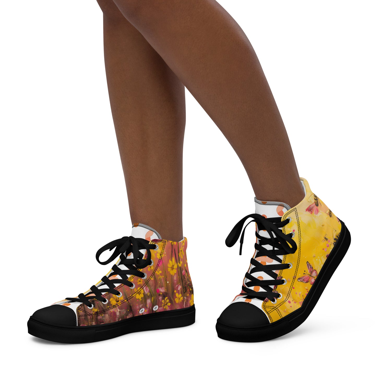 a persons feet with a pair of shoes 